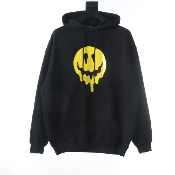Balenciaga dissolves a smiley face sweater