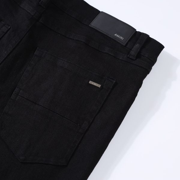 Amiri 22ss washed and ripped stretch-denim jeans - Image 6