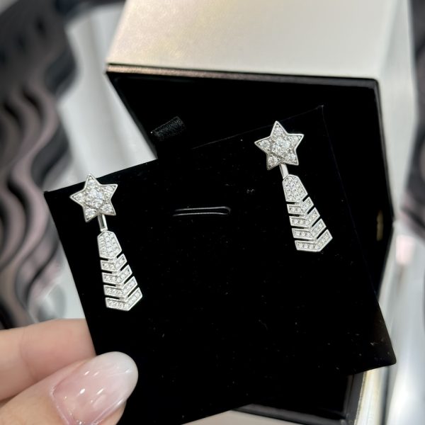 The new Chanel Comet Meteor Stud Earrings can be worn with a pentagram on its own