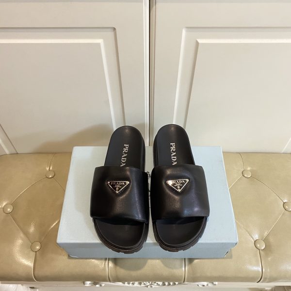 Prada’s new slippers in sheepskin black